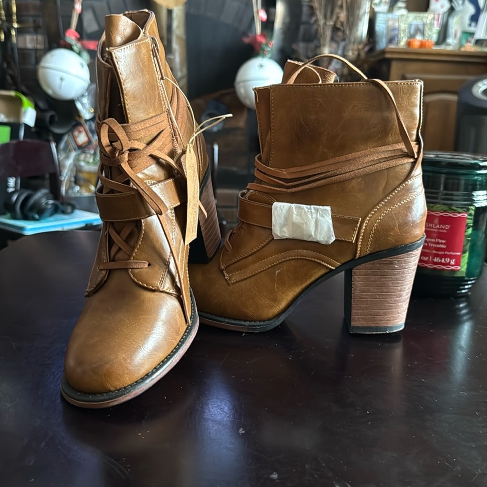 These 93 vintage ankle boots are a most!  Size is 8 1/2 and has not been worn.